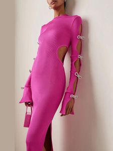 カジュアルドレスハイストリートEST 2024デザイナースタイリッシュファッション女性セクシーな弓ダイヤモンドビーズホロースリットロングドレス