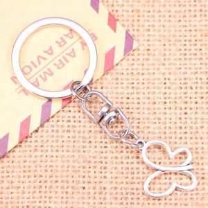 Nyckelringar 20st Fashion KeyChain 20x19mm ihåliga fjäril hängsmycken diy män smycken bil nyckelkedja ringhållare souvenir för gåva