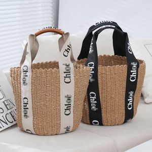 Simple and Generous Women s Bucket Creative Letter Strap Shoulder with Large Capacity Commuting Tote Straw Woven Bag factory direct sales