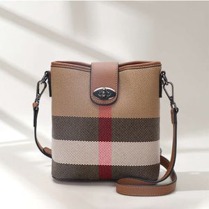 Qiandian Genuine Leather Checkered Bucket New Summer Versatile Unique High End One Shoulder Crossbody Bag for Women factory direct sales