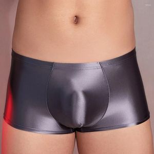 Mutande Boxer da uomo sexy Slip olio lucido Solido rigonfiamento Mutandine Biancheria intima a vita bassa Lingerie elastica Pantaloncini maschili Tronchi