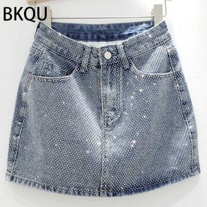 Kjolar BKQU 2023 Nya Rhinestone denim Mini kjolar Kvinnor Fashion Party Club Diamonds Hög midja Jean kjol Y2K Eesthetic Korean Bottoms J240202 J240217