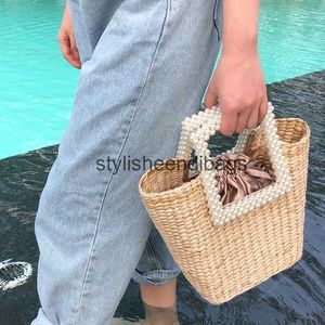 Totes fashion pearls handle rattan women handbags luxury chains wicker woven shoulder crossbody bags lady summer beach bali straw bagH24217