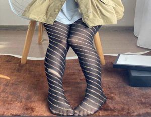Nya moderskapsbottnar damer strumpor tights sexiga kvinnors hoSiery mode kausal strumpbyxor svart guldtråd nät strumpning kvinnlig le8250367