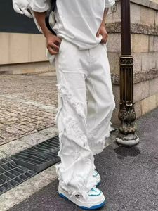 Styl amerykański uszkodzenie erozji Raw Edge Street Jeans Męski styl harajuku taniec hiphopowy proste białe dżinsy damskie ubranie Y2K 240122