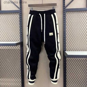 Męskie spodnie koreańskie moda drukowana Hip Hop Elastyczne talii Pants Men Joggers Streetwear Pants Spodnie mankietowe skokowe spodnie Męskie ubranie T240218