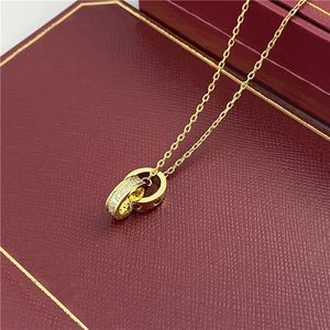 2024 Kvinnors halsband för kvinna älskar smycken guldhänge Dual ring rostfritt stål juvelery mode ovala sammanlåsande ringar Klavikulära kedjehalsband Designerq10