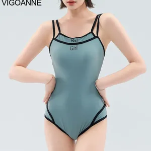 Kvinnors badkläder Vigoanne Solid Strapped Sexy Women 2024 Push Up Hollow One Piece Swimsuit Korean Stängd Monokini Beach Bathing Suit