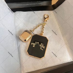 Black Gold Chocolate Keychain Pendant Womens Bag Hanging Decorative Chain Mens Casual Car Key Chains Designer Portable Geometric Keychains