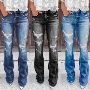 Jeans da donna anni '90 Vintage con bottoni a vita alta e gamba svasata Pantaloni classici in denim elasticizzati con fondo a campana S Blu