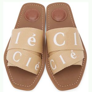 Дизайнерские тапочки Woody Sandals, тканевые шлепанцы с буквами из холста, роскошные брендовые шлепанцы, сандалии на плоской подошве. Удобные модные модные домашние песочные тапочки с открытым носком на открытом воздухе 02