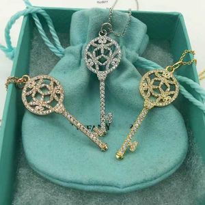 Ed4a Pendant Necklaces 925 Sterling Silver Tiffanynet Dragonfly Iris Flower Set Diamond Key Necklace for Girls Fashion Versatile High Grade Collar Chain
