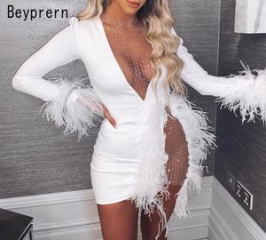 BeyPrernエレガントな白いメッシュ挿入装飾されたミニドレス女性グラムフェザーパッチワークホローアウトスパンコールのパーティードレス5164190
