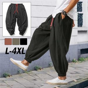 Herrbyxor bomullslinne harem män solid färg elastisk midja streetwear joggar 2024 lösa drop-crotch casual byxor