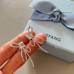 HEFANG brand luxury bowknot designer earrings stud for women shining crystal diamond knot sweet CZ zircon silver earring ear rings earings jewelry