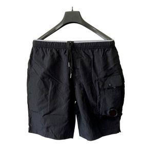Topstoney Metal Nylon Beach Pants Shorts Five Pants Men's Fashion Summer Pants BD8645 Casual Running Loose Quick Torking Sports Shorts Par Sammantaget