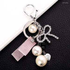 Keychains högkvalitativa pärlor Rhinestone Bowknot Keychain Pearls Tassel Key Chain Present For Women Girl Car Bag Fashion Accessories Keyring