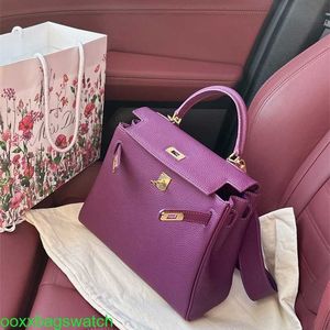 Ky Leather Handbag Trusted Luxury Womens Bags 2024 New Sea Anemone Purple Headed Cowhide Wide Shoulder Strap Ky Bag Single Shoulder Crossbody Womens BA With Logo HBPD