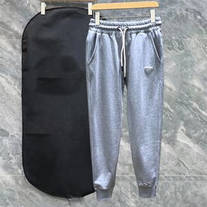 Men's cargo pants fashion sweatpants trendy brand spring casual minimalist triangular metal logo pants drawstring pocket size S-XL