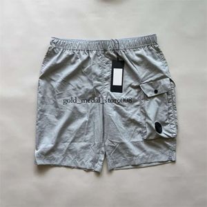 Stones Island Summer Men Short Pocket Lens Nylon Swim Shorts Snabbtorkning Shorts Sport Casual Mens Cargo Pants Loose M-XXL 106