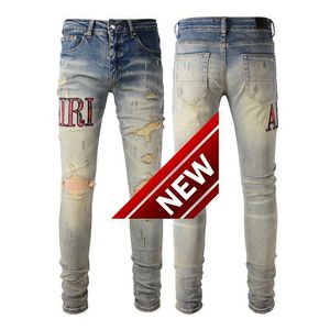 Jeans attillati elasticizzati blu ricamati moda di strada