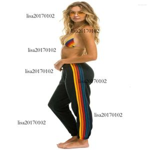 Calças femininas moda europa-eua estilo sweatpants mulheres cintura elástica arco-íris listrado magro pequeno pé esporte