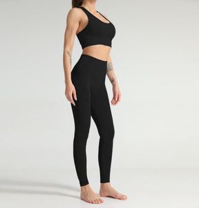 Designer Women Yoga OWORE TORLESUITS FITNESS LEGGINGS FIT DWUSTY ZESTAW GYME NARODZENIE Ubrania Sport Bra High Taist Pant Active SU5250695