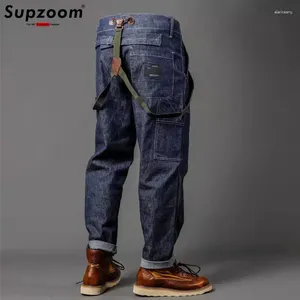 Jeans masculinos Supzoom Chegada Top Moda Outono e Inverno Macacões Casuais Moda Solta Gorda Multi-bolso Carga Denim