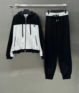 Women's Two Piece Pants designer brand 2024 Early Spring New Nanyou Pra Black and White Contrasting Zippered Hooded Jacket+elastic Waist Leggings Sports Set 355V