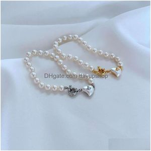 Designer High Quality Cold Breeze Artificial Knotting Fresh Pearl Heart Opening Gold-Plated Western Empress Dowager Temperament Women Dhkgf
