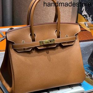 Väska 30 cm designer Golden Brown Grade Togo Leather Fashion Commuter Handväska läder Kvinnor