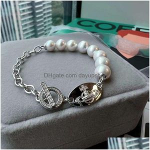 Designer High Quality 23 New Western Empress Dowager Diamond Oval Pearl Bracelet For Womens Fashion Small Versatile Handicrafts Light Dh6Yl
