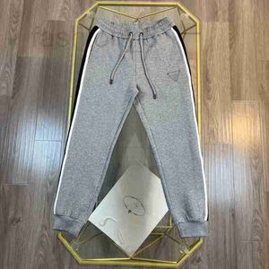 Men's Pants Designer Top Autumn New Letter Triangle Logo Casual Feet Pants V460