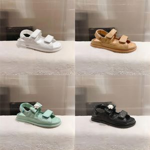 Designer sandals da donna Scarpe da spiaggia Shoemaker Luxury Sole Sole Slifori Scarpe da donna Casualmente Scarpe da donna in pelle autentica Summer Lussuoso Tory Bianco Nero