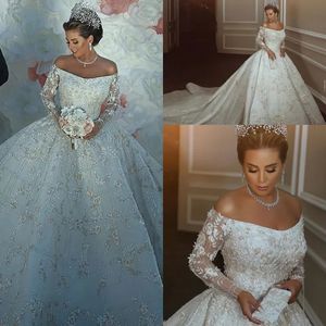 Luxury Dubai Wedding Dresses Off The Shoulder Sparkly Beading Appliques Bridal Gowns Sheer Long Sleeves Saudi Arabia Wedding Vestidos