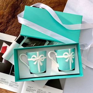 Tasarımcı mavi kupa kemik porselen çift fincan bowknot kahve fincanı hediye kutusu iş hediye su bardağı