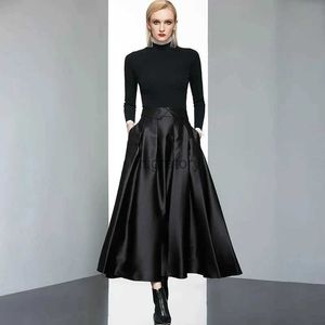 Kjolar skorts wwomens design lång kjol kvinnlig höst vinter ny europeisk amerikansk vind svart temperament satinskirt faldas mujer moda yq240223