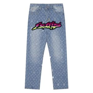 Jeans da donna con fiamma stampata con graffiti sfumati Jeans svasati patchwork stampati Jeans high street slim fit ricamati