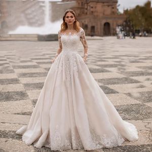 Abito da sposa principessa Boho Donna Splendide maniche lunghe Applicazioni in pizzo Pieghe A Line Abito da sposa Abiti da sposa da spiaggia Abiti bohémien Robe De