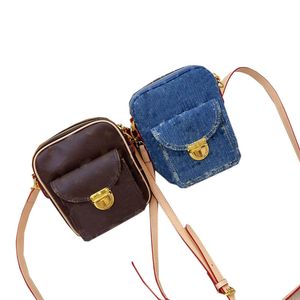 Bolsa de ombro mini câmera jeans azul designer