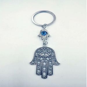 Biżuteria mody Anioł Wings Evil Eye Hamsa Fatima Hand Charm DIY Blakein srebrny ton łańcuch kluczyek Keyring Modna biżuteria wisząca 248S