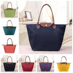 Designer Frauen faltbare Nylon -Einkaufstaschen European Casual Schulterknödel Tasche gesticktes Handtasche Multi -Farb -Einkaufstasche