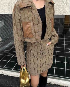 Two Piece Dress designer Women's 24 designer suit V-neck jacket half skirt full print patchwork leather set fashionable and high-end temperament 220 M9BU