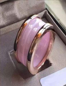 Koreański ceramiczny mężczyzna i kobieta różowy pierścionek Wysokiej jakości luksusowy projektant biżuterii ze stali nierdzewnej 2020 Nowa para prezentowa pierścień Whole PE4728864