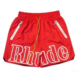 Projektant Rhude Designer Shorts Męskie Modne spodnie plażowe Sports Fitness Luxury High Quality Shorts Summer Casual Wszechstronne szybkie suszące oddychające spodnie z siatki kategorie