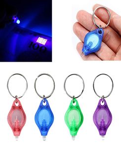 UV -lampor Mini KeyChain LED -ficklampa Promotion Gift Torch Lamp Key Ring Light White Purple Flash Light Ultraviolet5186250