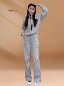 Spring Outfits Paired with A Complete of 2024 New Light Luxury, Fashionable Western-style Striped Style Personalized Coat and Wide Leg Pants Two-piece Set