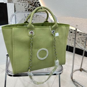 Tasarımcı omuz çantaları 5a lüks çanta kadın alışveriş çantaları plaj çantası büyük kapasiteli mektup desen totes üst bayan cüzdan birden çok renk