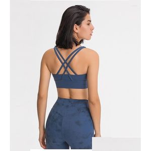 Abbigliamento da yoga Abbigliamento da donna Crop Gym Top Fitness Reggiseno sportivo senza cuciture Intimo sportivo per esterni Abbigliamento sportivo con imbottitura sul petto Logo personalizzato D Dhobz