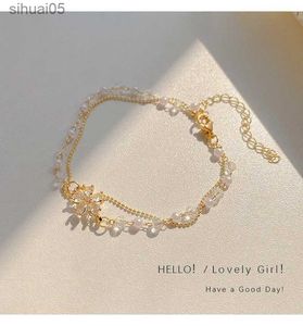 Perline delicato e delicato doppio strato perla braccialetto di fiori di cristallo design di nicchia accessori per le mani braccialetto regalo di compleanno per feste da donna YQ240226